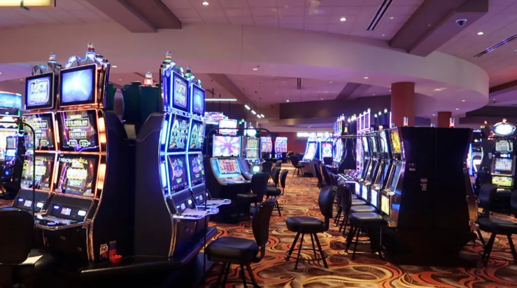 Casino floor at Dakota Magic Casino &amp; Hotel in North Dakota featuring rows of slot machines