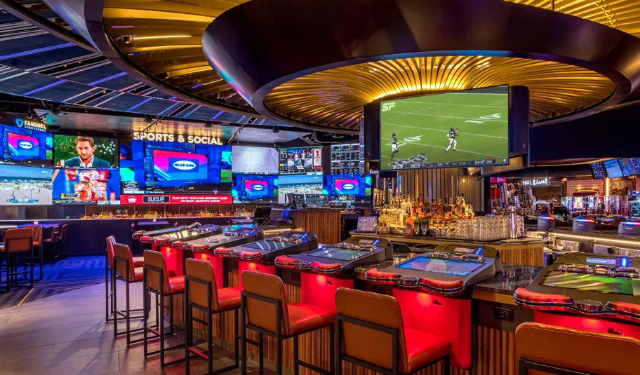 Bar area inside Live! Casino &amp; Hotel Maryland near Washington DC, offering virtual casino games at each seat