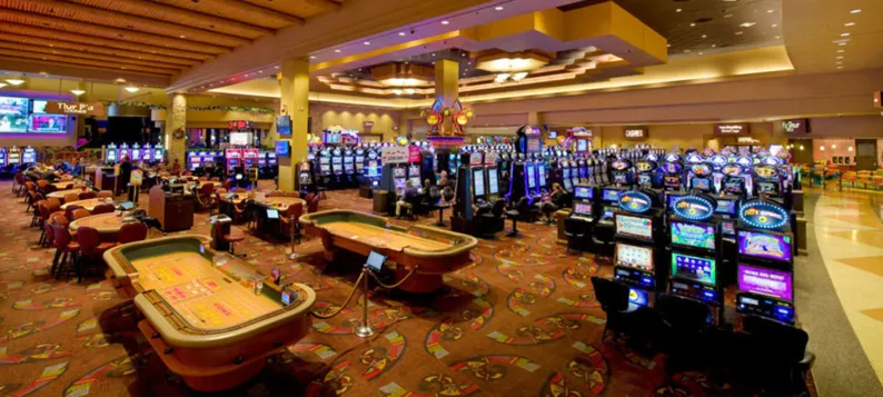 Casino floor at Sandia Resort &amp; Casino in New Mexico with slot machines and gaming tables