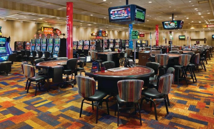 Casino floor at Indiana's Ameristar Casino East Chicago with rows of slot machines and table games under bright lights