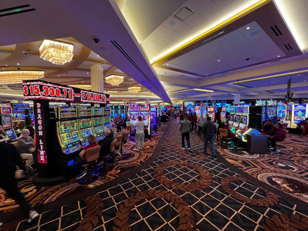 Casino floor inside Caesars Virginia with slot machines and table games