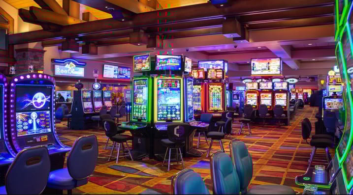 Inside Silver Reef Casino Resort with Washington players at slot machines on the main casino floor
