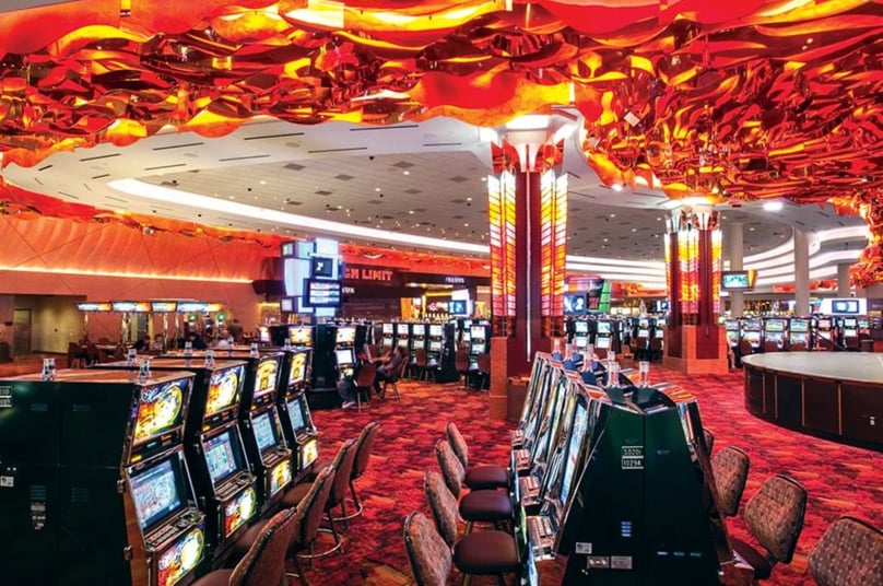 Casino floor at Mystic Lake in Minnesota with slot machines and colorful lights