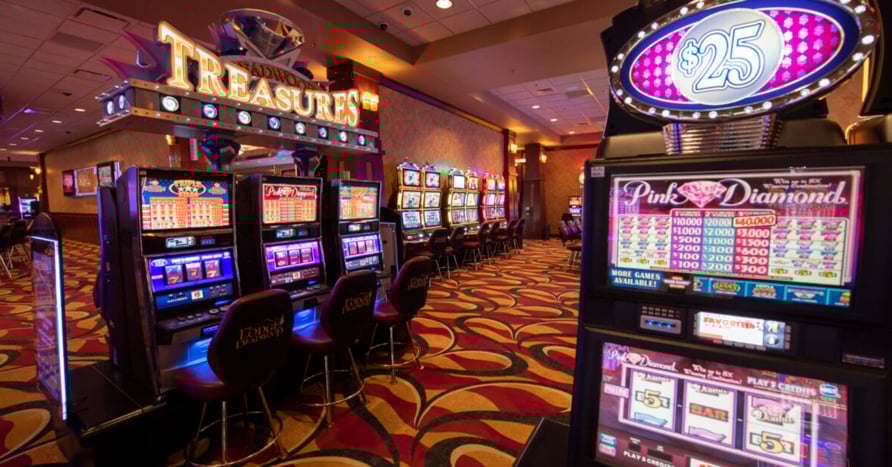 Slot machines lined up inside The Lodge at Deadwood Casino in South Dakota