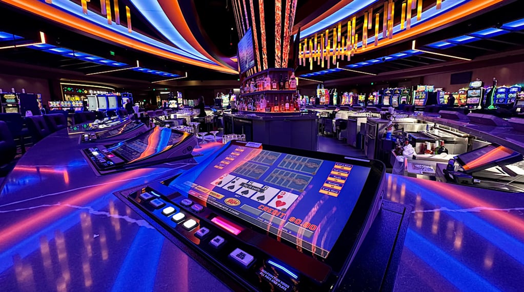 Video poker at the bar in Potawatomi Casino Hotel Milwaukee, with slot machines in the background