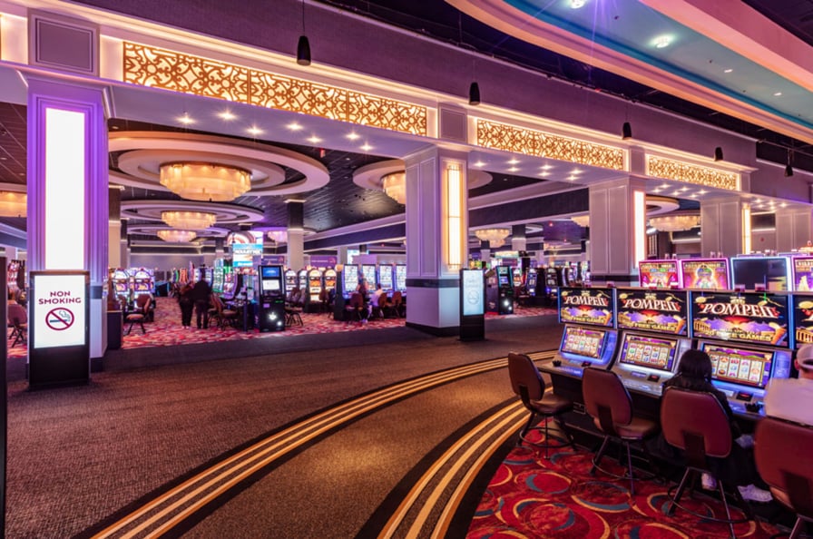 Casino floor at WinStar World Casino & Resort with rows of slot machines shown